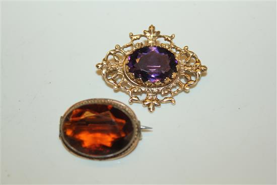 Gold and amethyst brooch and a paste brooch